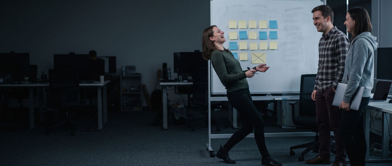 A whiteboard deal review — the qualification framework in use.